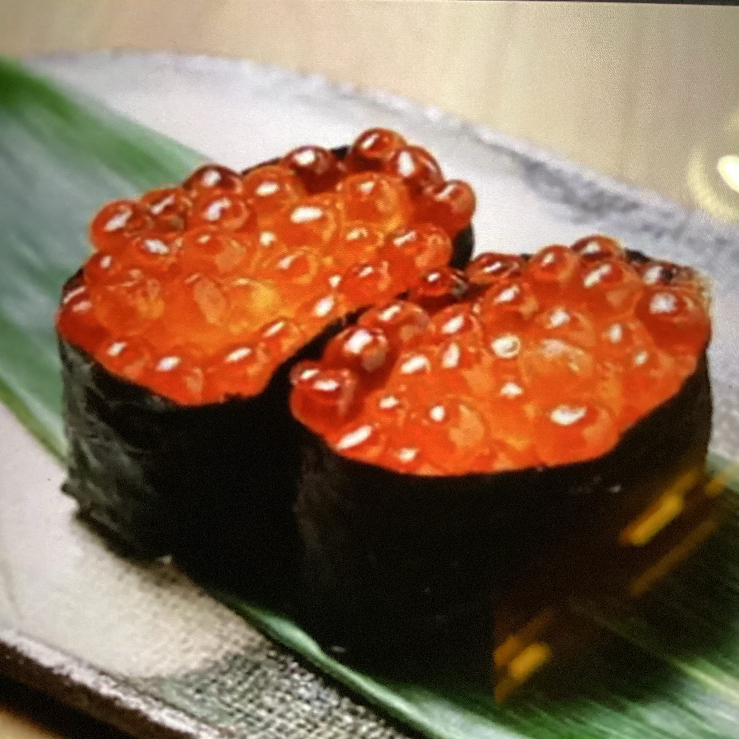 Ikura Nigiri (Salmon Roe).